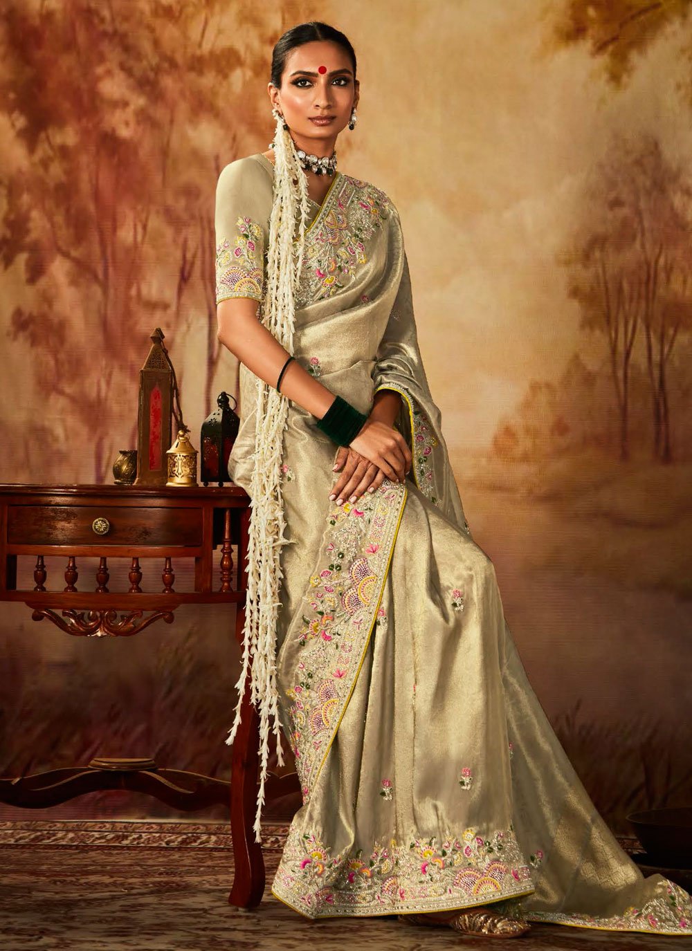 Can I wear a designer saree for a traditional wedding reception? - Quora