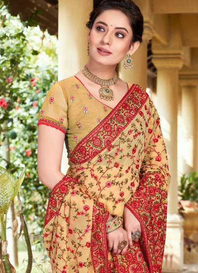 Affectionate Beige Embroidered Georgette Classic Saree