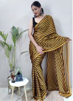 Attractive Silk Black and Gold Trendy Saree
