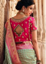 Awesome Silk Green Embroidered Designer Saree