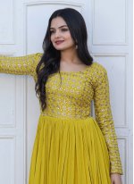 Charming Faux Georgette Zari Yellow Trendy Gown