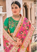 Charming Silk Orange and Pink Patch Border Bollywood Saree