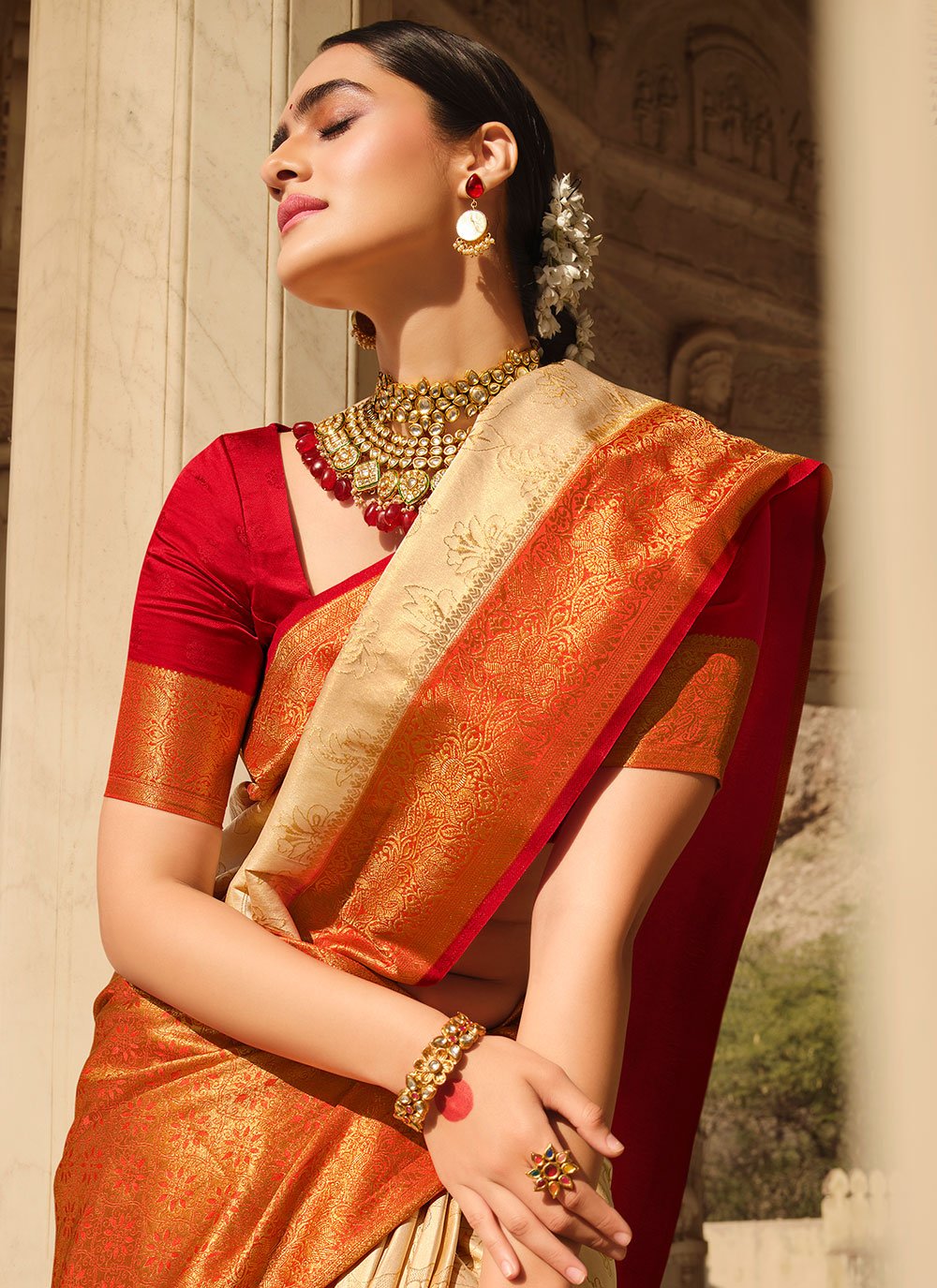 Cream Bridal Woven Banarasi Silk Saree With Red Blouse