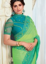 Classical Prachi Desai Green and Yellow Faux Chiffon Shaded Saree