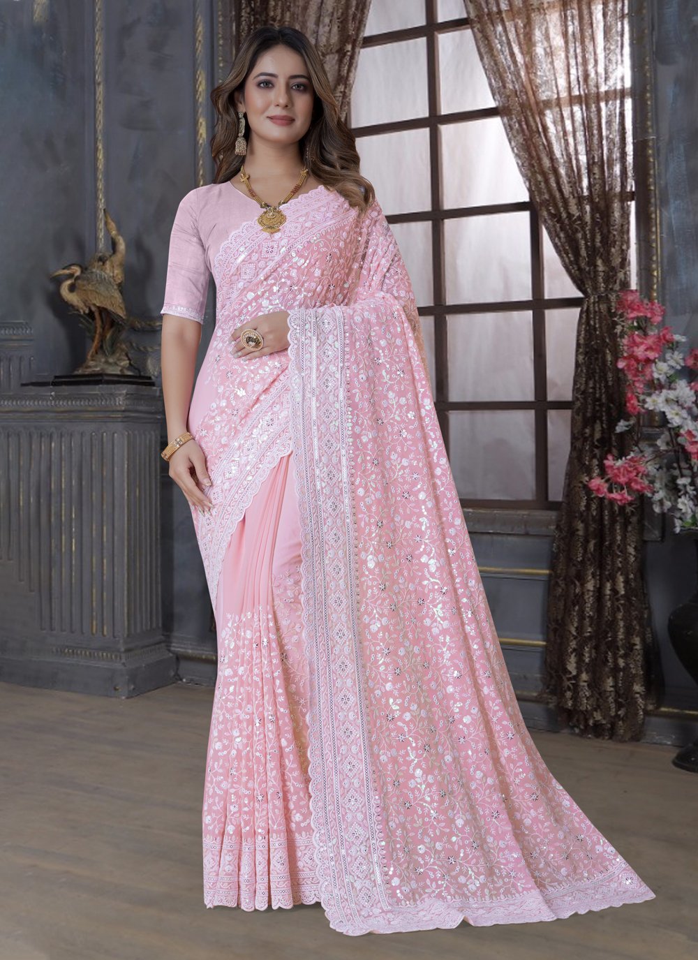 Demure Pink Sequins Georgette Trendy Saree 