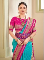 Engrossing Patola Print Turquoise Silk Traditional Saree