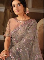Exotic Grey and Pink Embroidered Net Trendy Saree