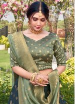Eye-Catchy Silk Teal Weaving Bollywood Lehenga Choli