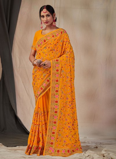 Fashionable Embroidered Mustard Georgette Classic Saree