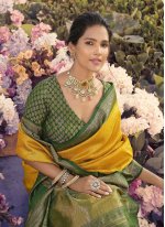 Flattering Kanjivaram Silk Green and Mustard Jacquard Work Trendy Saree