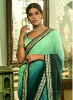 Glamorous Rama and Sea Green Trendy Saree