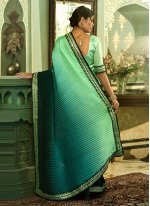 Glamorous Rama and Sea Green Trendy Saree