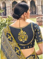 Magnetic Green Weaving Silk Designer Saree