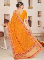 Prepossessing Orange Embroidered Saree