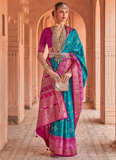 Renowned Patola Print Blue and Turquoise Silk Trendy Saree