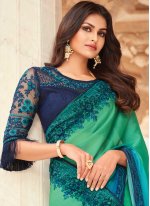 Sensible Blue and Sea Green Embroidered Shaded Saree