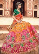 Silk Embroidered Designer Lehenga Choli in Orange and Pink