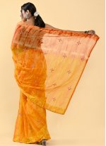 Spectacular Orange and Yellow Sequins Shaded Saree