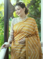 Striking Printed Tussar Silk Yellow Traditional Designer Saree