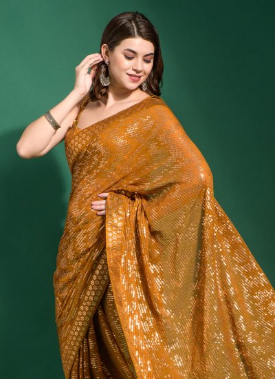 Superb Embroidered Georgette Gold Trendy Saree