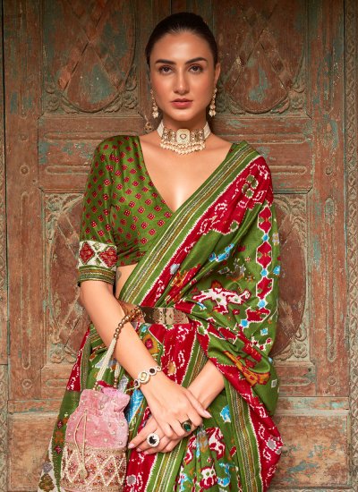 Tempting Patola Silk  Green Weaving Designer Saree