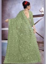 Titillating Net Embroidered Traditional Designer Saree