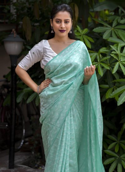 Georgette Woven Trendy Saree in Green