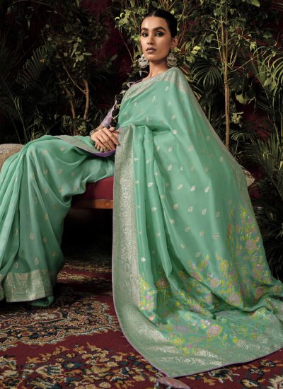 Intriguing Sea Green Weaving Classic Saree