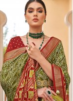 Staggering Green Patola Silk  Trendy Saree