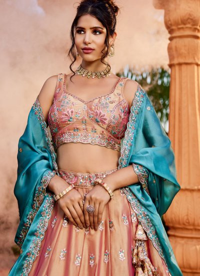
                            Astonishing Zari Beige and Peach Georgette Designer Long Lehenga Choli