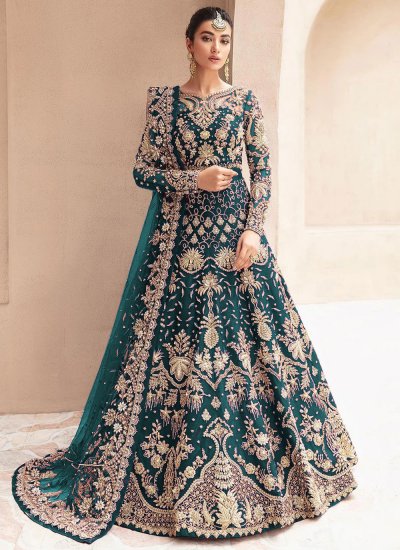 mukesh dresses designs Make an exquisite appearance in this heavy Mukesh frock ensemble,  showcasing regality and style. Done finely, the elegance of this outfit  stands out, making a statement for the festive season. Available at