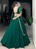 Demure Green Plain Georgette A Line Lehenga Choli