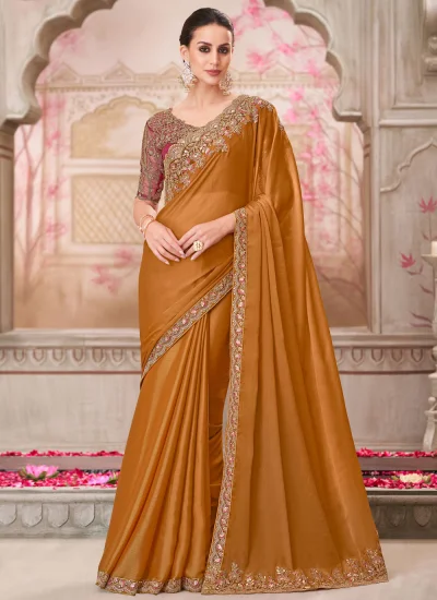 Irresistible Silk Embroidered Rust Designer Saree
