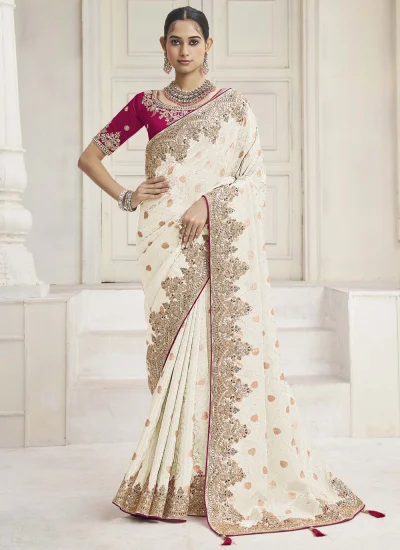 Masterly Embroidered Cream Tissue Traditional Saree