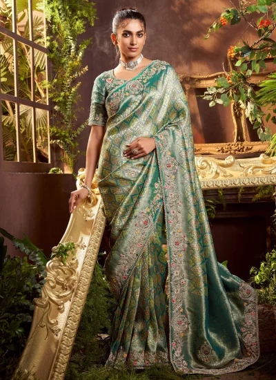 Surpassing Silk Embroidered Green Classic Saree