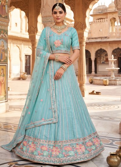 Aristocratic Net Sequins Firozi Lehenga Choli
