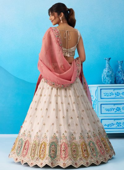 
                            Cream Embroidered Lehenga Choli