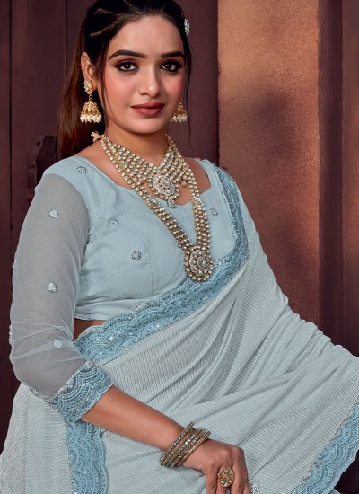 
                            Enthralling Aqua Blue Embroidered Trendy Saree