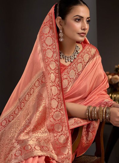 
                            Fetching Viscose Peach Woven Contemporary Saree