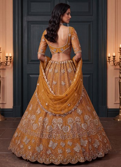 
                            Gold Net Ceremonial Designer Lehenga Choli