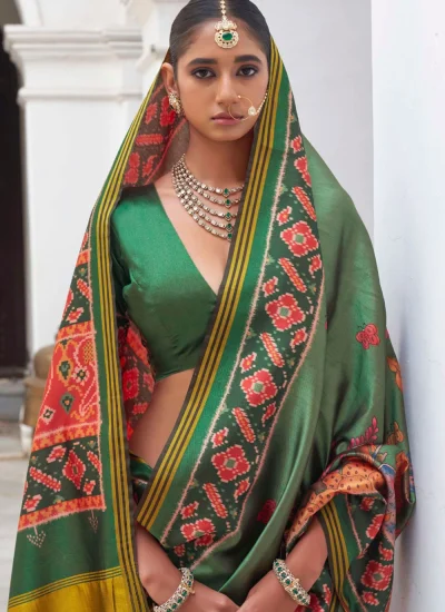 
                            Green Patola Print Classic Saree
