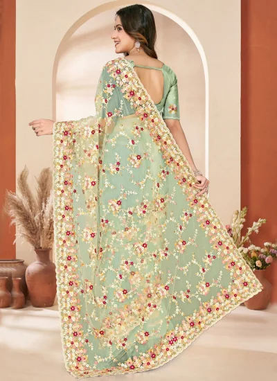 
                            Masterly Embroidered Net Green Traditional Saree