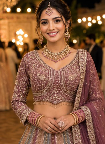 
                            Multi Colour Zari Net Lehenga Choli