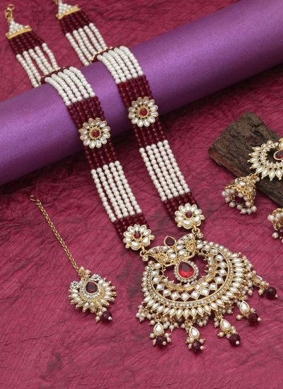 
                            Necklace Set Stone Work in Maroon and White Colour