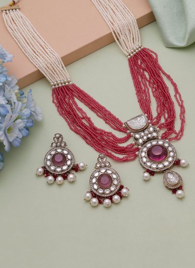 
                            Stone Work Necklace Set in Magenta and White Colour