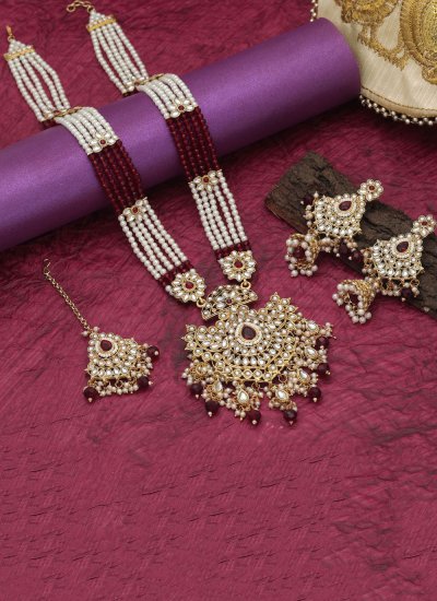 
                            Stone Work Necklace Set in Maroon and White Colour