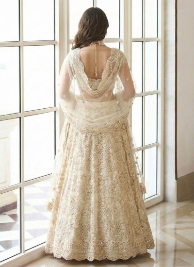 
                            Titillating Cream Embroidered Designer Lehenga Choli