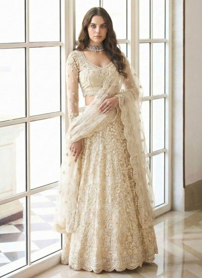 Titillating Cream Embroidered Designer Lehenga Choli