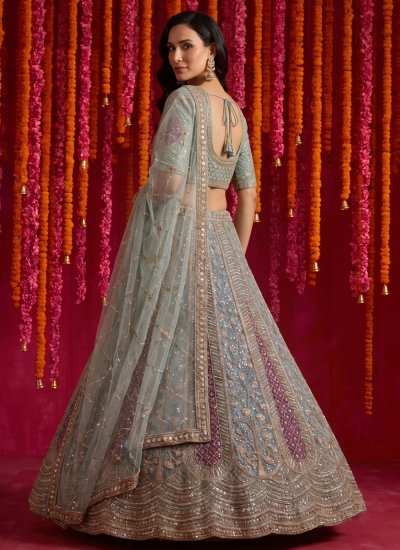 
                            Turquoise Net Embroidered Lehenga Choli
